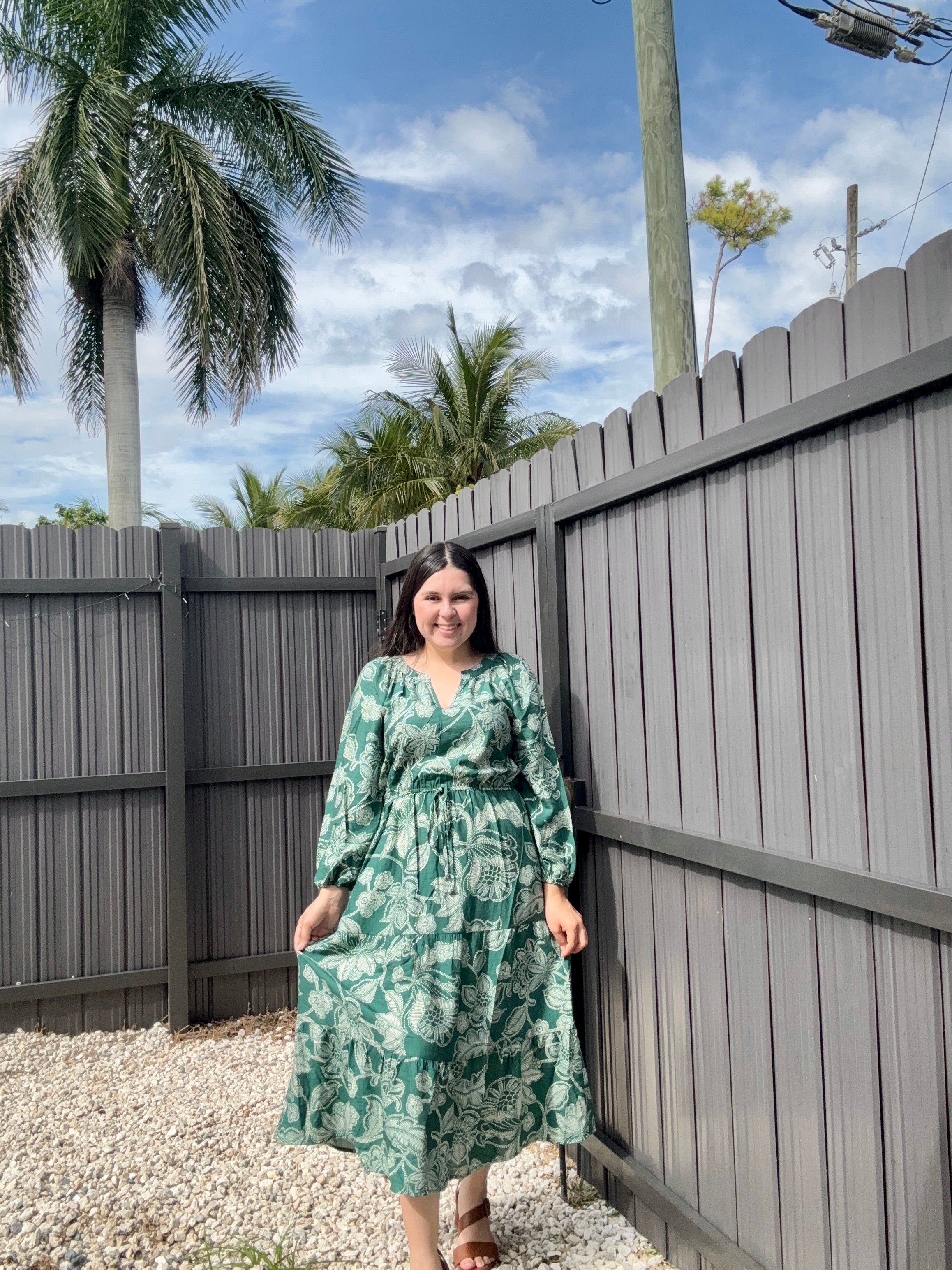 Dresses featuring floral prints and long sleeves.