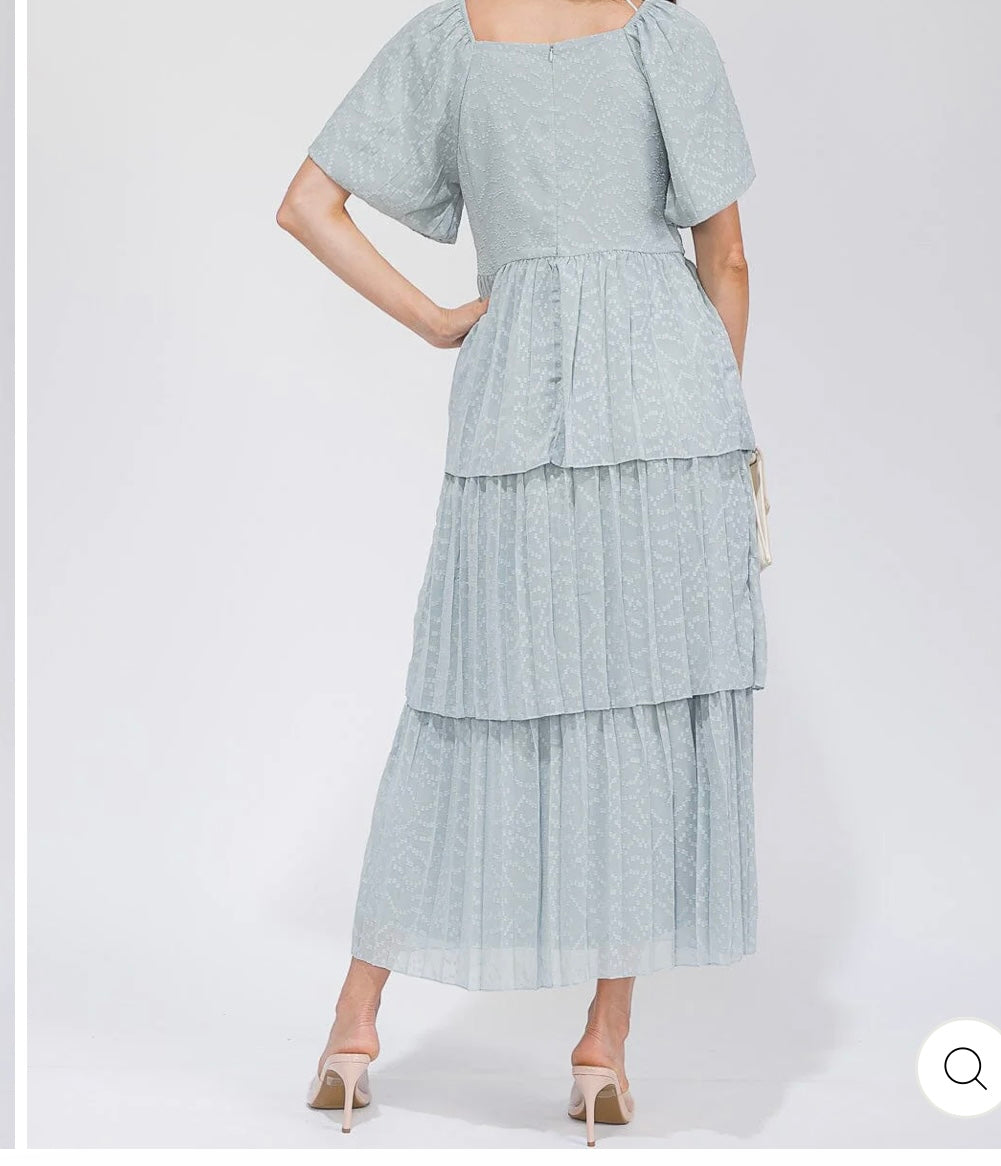 Long sleeve V-neck Swiss ruffle tiered maxi dress.