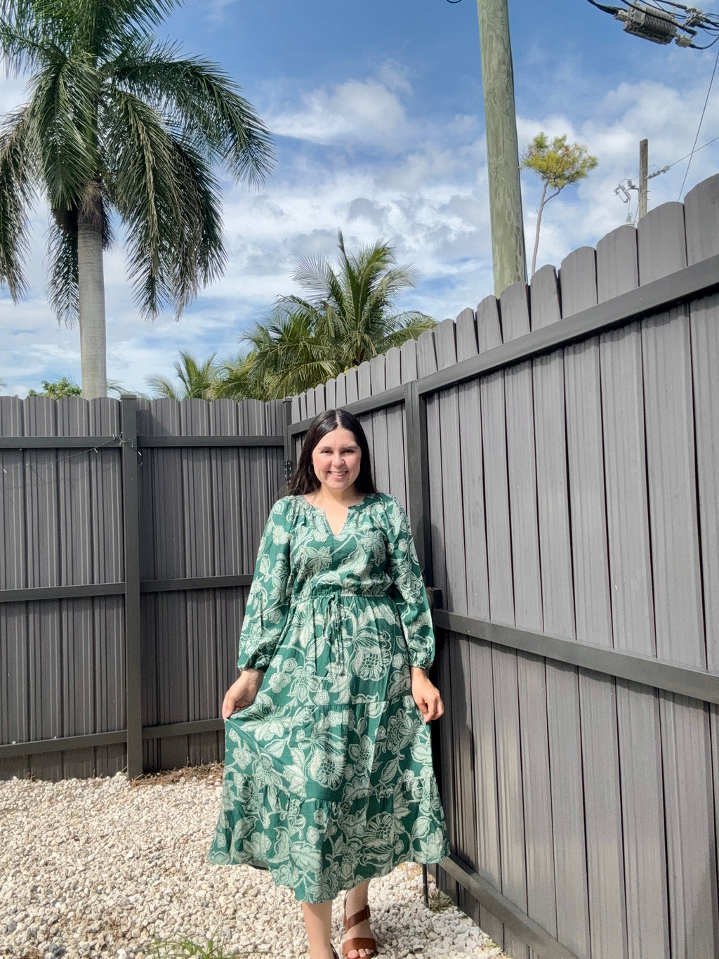 Dresses featuring floral prints and long sleeves.