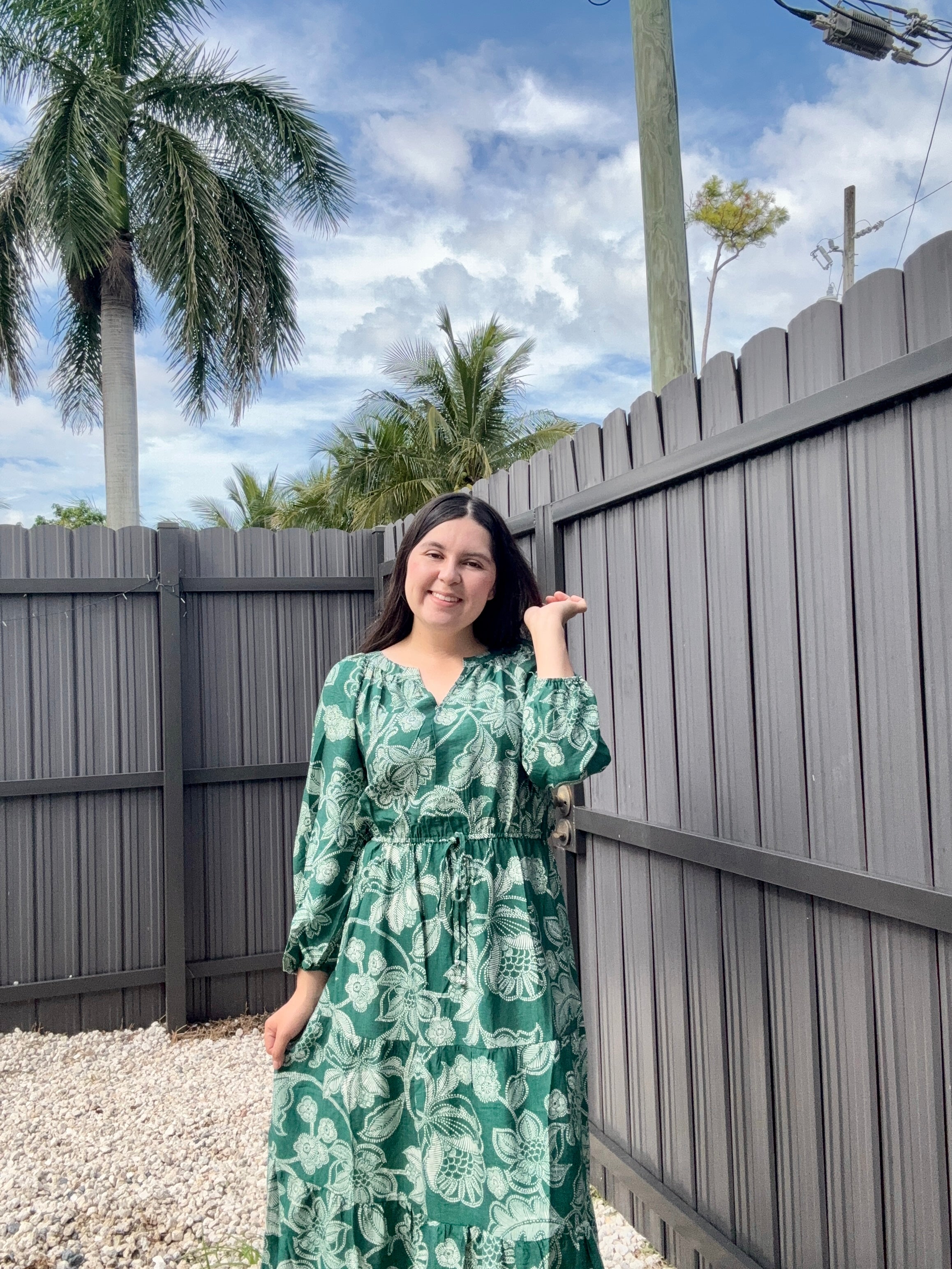 Dresses featuring floral prints and long sleeves.